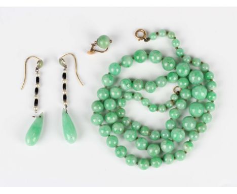 A single row necklace of graduated spherical jade beads on a boltring clasp, length 54.5cm, a pair of Art Deco jade and seed 