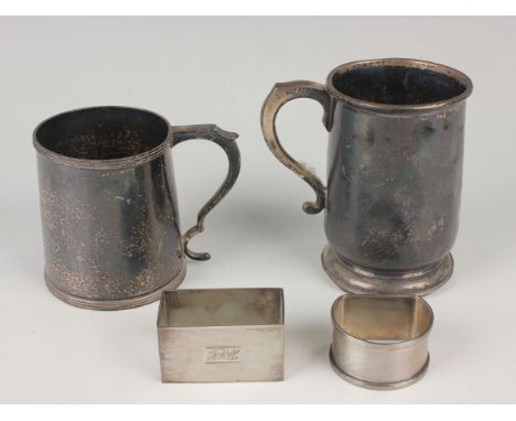 An Edwardian silver tapering cylindrical christening tankard with scroll handle and reeded rims, Sheffield 1907 by Walker &am