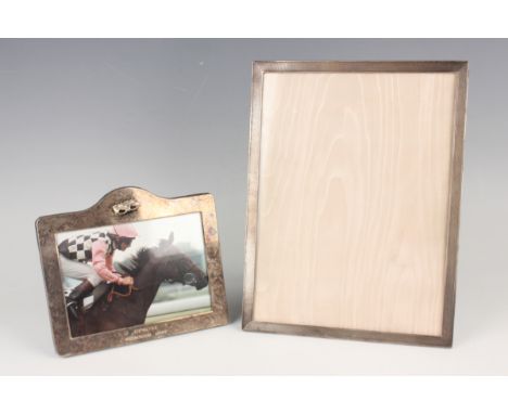 A 20th century French silver rectangular photograph frame with engine turned decoration, height 26.3cm, together with a plate