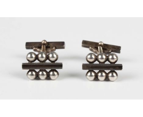 A pair of Georg Jensen sterling silver cufflinks, 1930s/40s, designed by Harold Nielsen, the fronts in a bar and beaded desig
