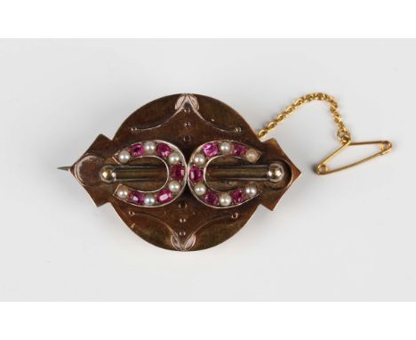 A late Victorian gold, ruby and half-pearl brooch, the front applied with a bar and two horseshoes, each horseshoe mounted wi