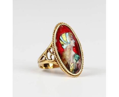 A French gold and Limoges enamelled oval ring, early 20th century, designed as a portrait of a Renaissance style woman within