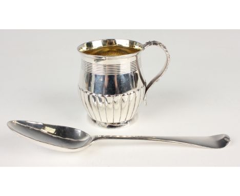 A George III silver christening tankard of half-reeded form with foliate handle, London 1817, weight 120.7g, height 8cm, and 