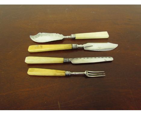 Two Georgian Joseph Taylor silver butter knives with ivory handles Birmingham 1818, 1809 and a Joseph Taylor kinife and fork 