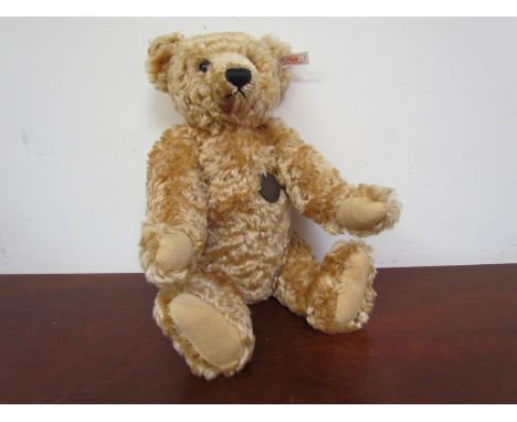 A Steiff bear "Hamleys Winston" Limited Edition with growler, approximately 29cm tall, seated 