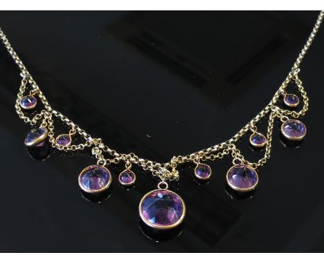 A Victorian and later gold multi-amethyst stone drop chandelier necklace, unmarked