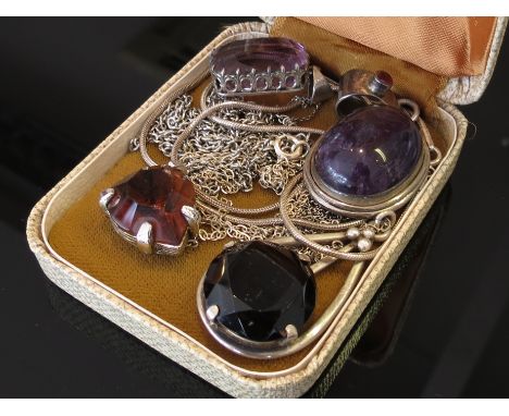 Four pendant necklaces including amethyst examples