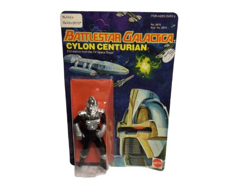 Mattel 1978 Battlestar Galactica Cylon Centurian 4" action figure with cylon laser rifle, on Series 1 unpunched card and blis