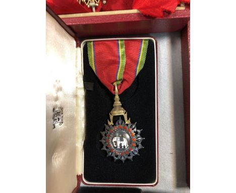 A collection of orders and decorations, mostly mid-20th century, to include Order of St. Stanilaus military division 2nd clas