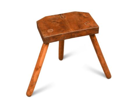 A late nineteenth/early twentieth century primitive stool, made entirely from solid yew wood  