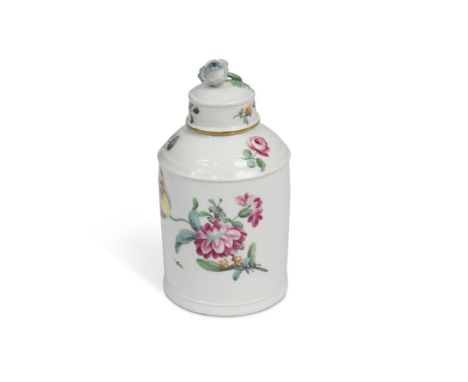 An 18th century Hochst porcelain tea caddy and cover, decorated with scattered floral sprays, the cover with flower finial, w
