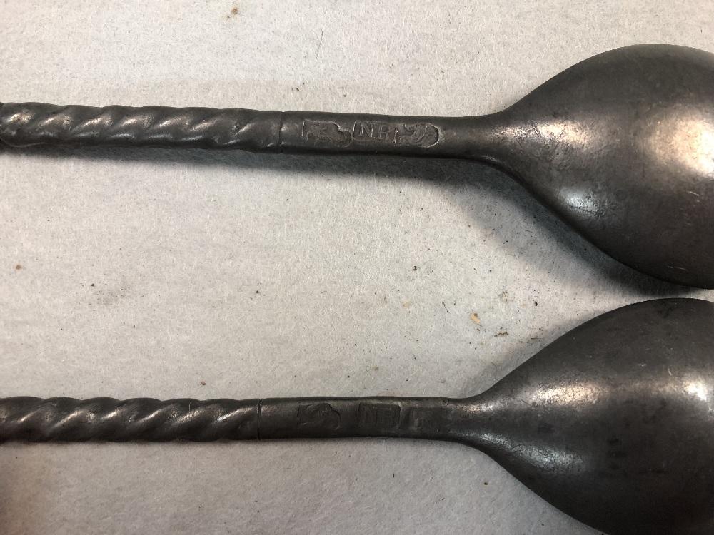 A set of three pewter shaped serving spoons, in Cheffins Fine Art