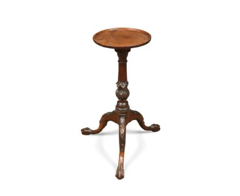 A George III mahogany tripod table, with a tray edge moulded top, on carved legs 63 x 26cm (25 x 10in)  