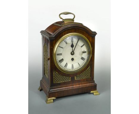A 19th century mahogany bracket timepiece, the single pad top with handle above 7inch painted circular dial, pierced lacquere