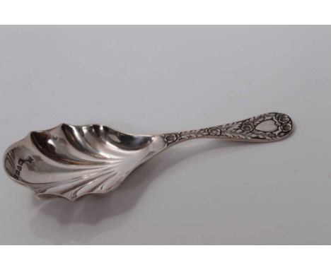 Edwardian silver shell bowl caddy spoon with cast floral leaf handle, Chester 1905, M.Friedlander &amp; Co.