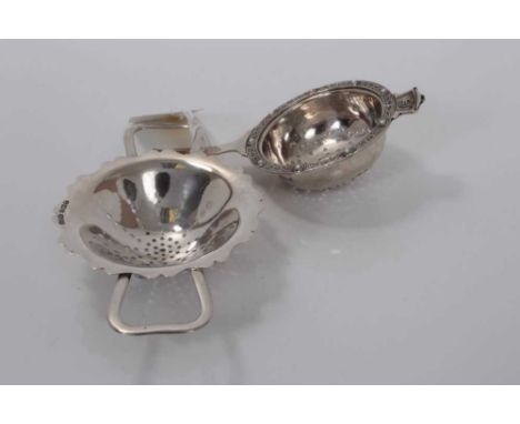 George VI silver tea strainer, (Birmingham 1943), together with another silver tea strainer (Birmingham 1958), (all at 2.7oz)