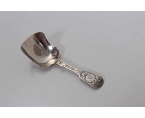 Victorian silver fiddle pattern caddy spoon with engraved decoration, (Birmingham 1873), maker George Unite, 9.3cm long, (0.3