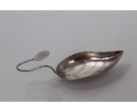 George III silver leaf-shaped bowl caddy spoon with bright cut decoration and wire loop handle , marks incomplete, maker Cock