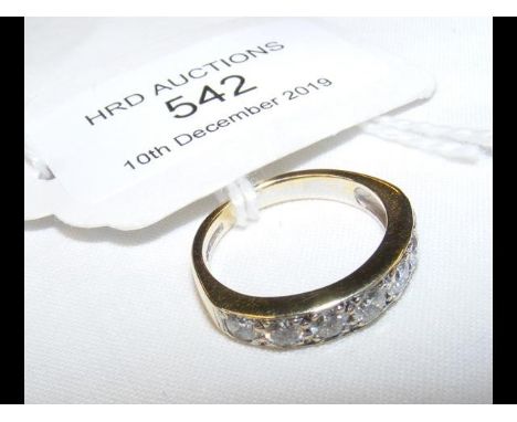 A seven stone diamond eternity ring - approx. 1.0 carat total - in 18ct gold setting CONDITION REPORTDiamonds appear of good 