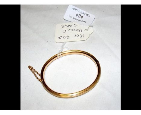 A lady's 15ct gold bangle CONDITION REPORT19cm wrist