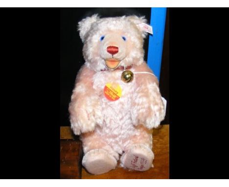 A collectable Steiff Bear 'Rosey' - 1999 - with growler and bag - 27cm long 