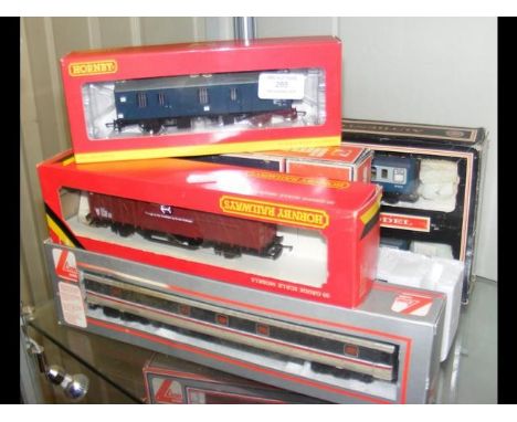 Boxed Hornby and Lima carriages and other 