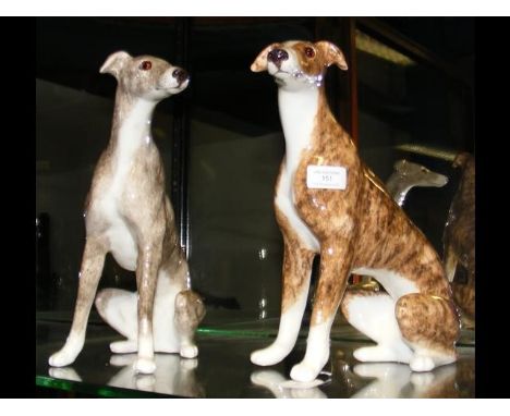 A pair of large Winstanley ceramic dog ornaments with mark to base - 31cm high 