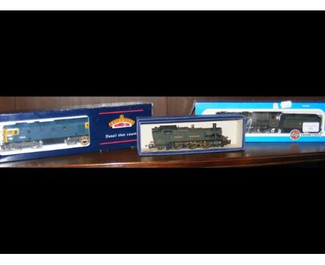 A boxed Bachmann Diesel Loco, together with two other locos 
