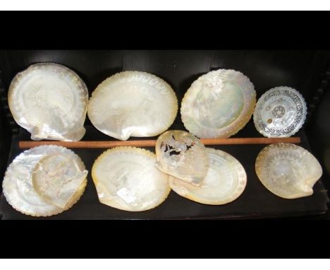 A collection of ten old carved and engraved oyster shells CONDITION REPORTgenerally good conditions