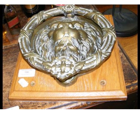 A 26cm antique 'Lion's head' door knocker 