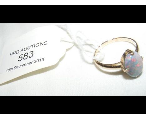 A lady's opal ring in 18ct gold setting CONDITION REPORTGood condition; ring size R; gross weight 3.7gms; opal size 10x7mm