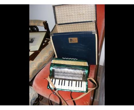 A Hohner child's accordion in carrying case 