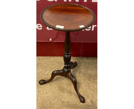 A Chippendale style mahogany tripod wine table 