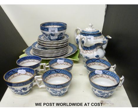 A Booths Real Old Willow tea set with extra sugar basin, a cake plate and a Royal Winton leaf dish