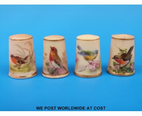 Four Royal Worcester thimbles hand decorated with birds (unmarked)