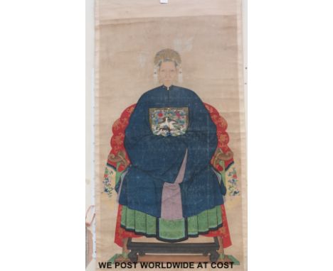 A 19thC Chinese ancestor scroll decorated with a portrait of an official 