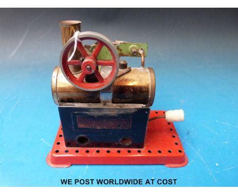 A Mamod Minor 2 overtype stationary live steam engine with early style vapourising lamp and no water level plug to the boiler