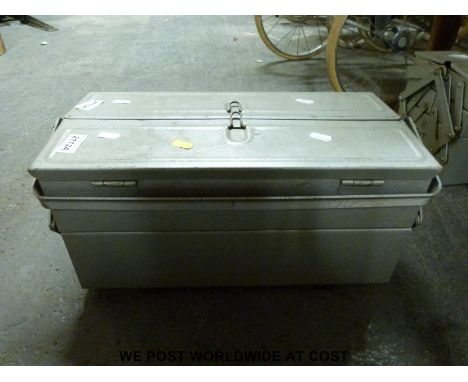 A tool box containing woodworking tools including chisels, files etc