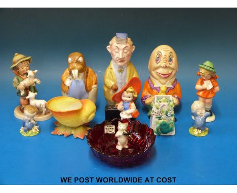 A collection of ceramic figures including Goebel Hummels, Wade 'Blynken', Beswick cat, Grainger Worcester shell vase, Sowerby