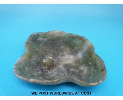 A 19thC Chinese spinach jade pin / ring dish modelled as a lily pad with frog