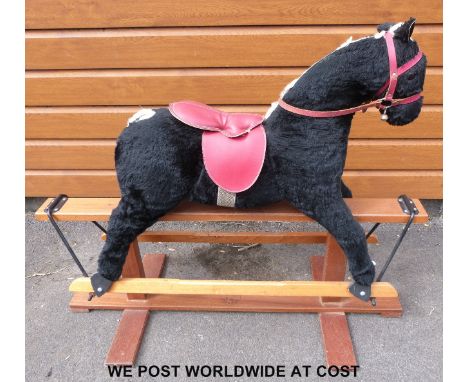 A c1970s plush rocking horse by 'Pegasus hand made toys' 78cm saddle height