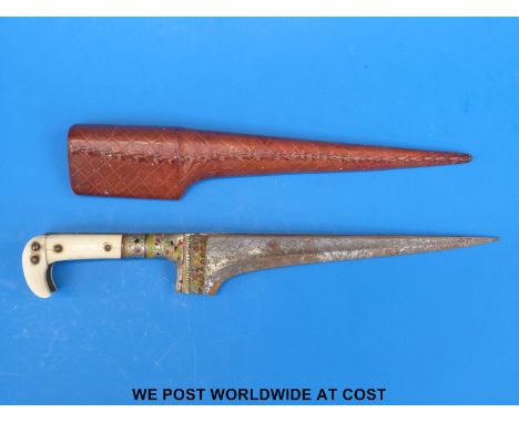 An Indian Pesh Kabz dagger in scabbard (overall length approximately 31cm)