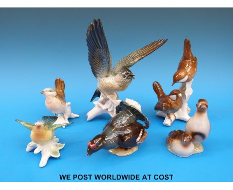 Four Karl Ens bird figures and two Goebel figures (tallest 20cm)