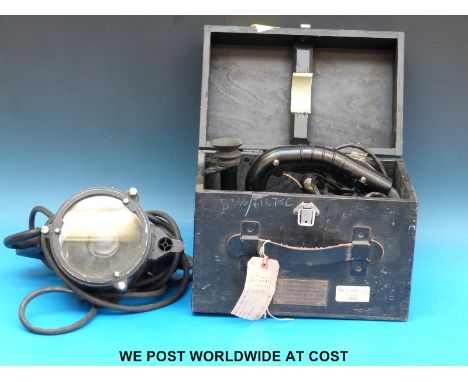 A cased Aldis signalling lamp and another similar example