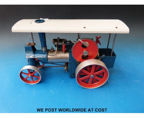 An early Wilesco live steam D40 traction engine 'Old Smokey' with the steam roller front, smoke box, instructions and paperwo