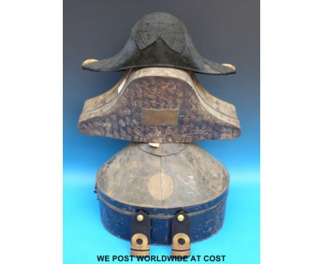 A late 19thC Naval Bicorn Officers 'Fore and Aft' style hat 6 7/8, in original metal case, marked W.A.F Maybourn R.N, togethe