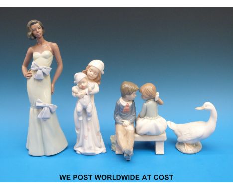 A group of four Lladro / Nao figures