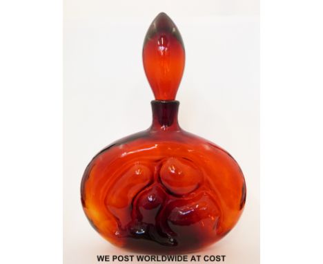 Wayne Husted for Blenko red glass decanter of flattened form with moulded design (34cm tall) 