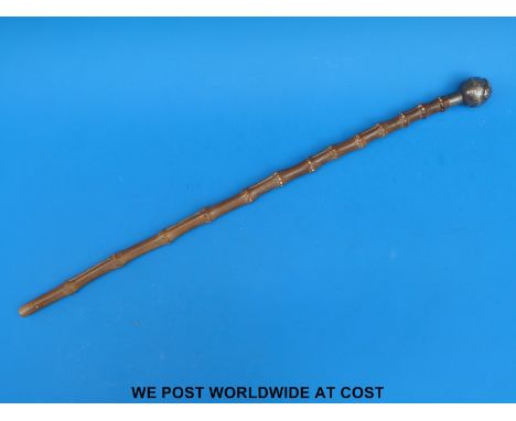A hallmarked silver topped Gold Coast Police swagger stick (length 54cm) 