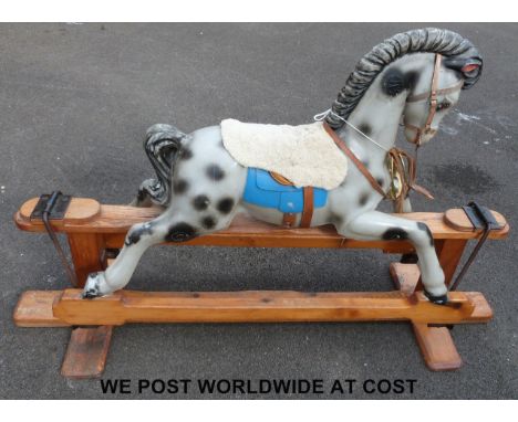 Wooden dappled rocking horse